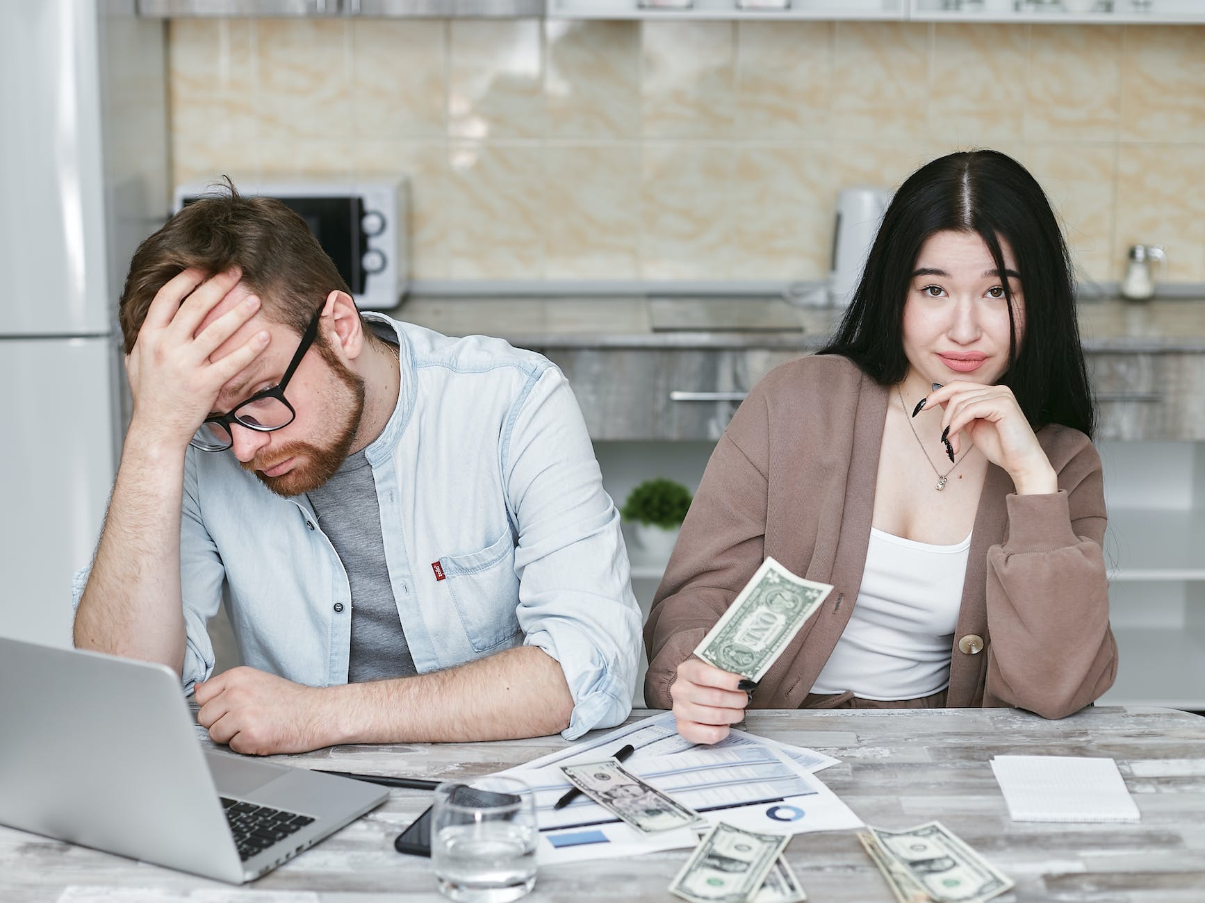 Here’s what do do if you and your partner can’t agree about how to split bills 