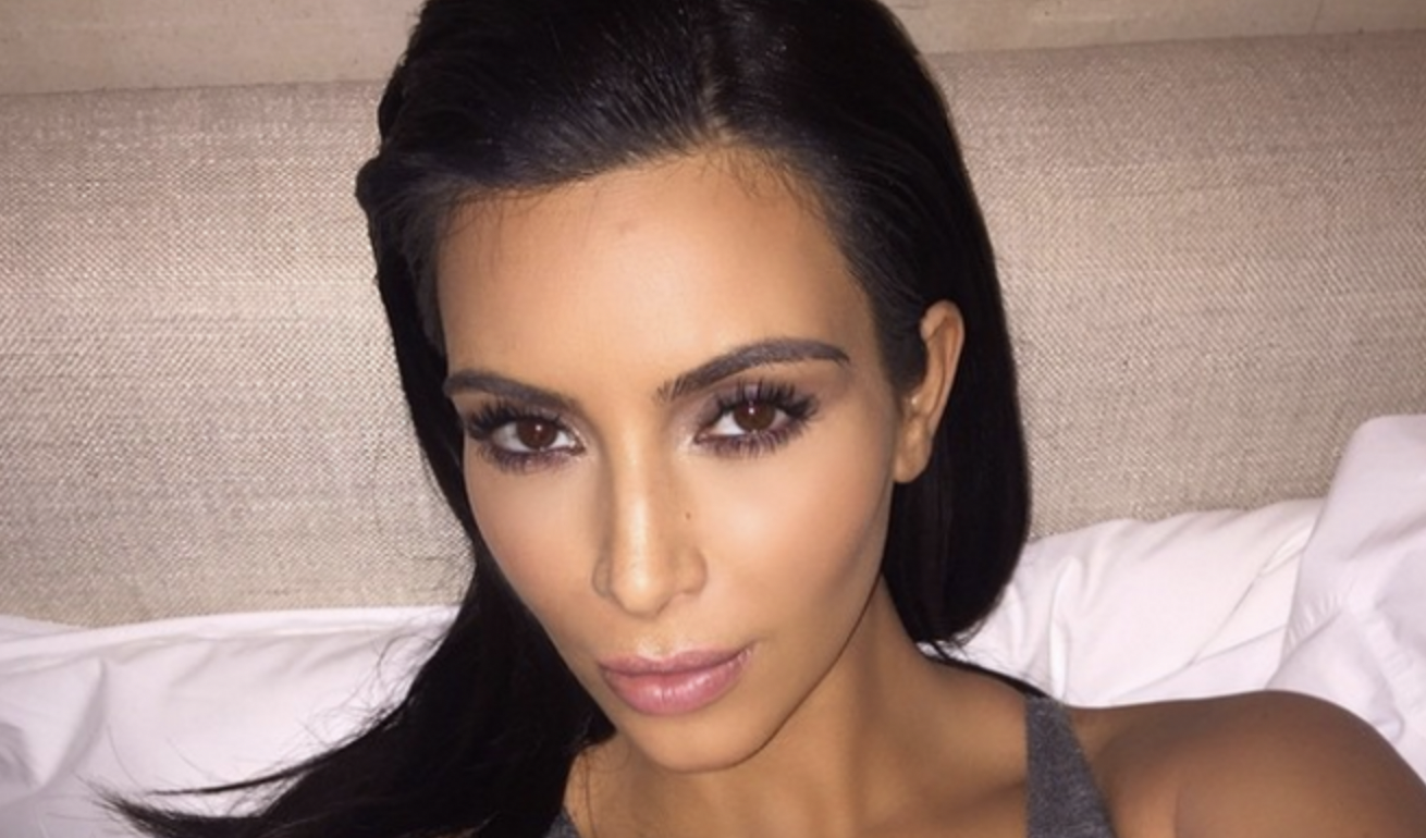 Kim Kardashian gets dragged for cuddling with Tesla robot