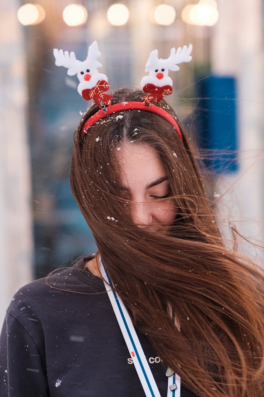 woman with reindeer on her headband